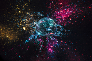 explosion of a glass ball with colored lights black background.