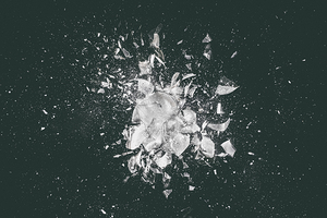 glass explosion on a dark background.