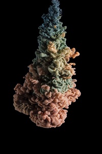 cloud of various acrylic colors expanding in water