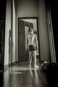 child standing in house