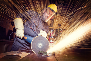 man with grinder in action