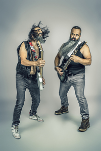 rockers with long beard play bass and guitar