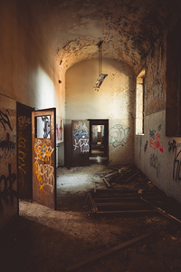 decaying interior of an abandoned building