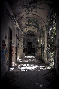 inside a decaying vandalised  structure