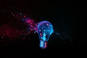 real explosion of a tungsten filament bulb. high speed photograp