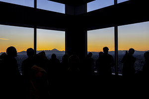 people observe the Fuji mountain  from the government buildin