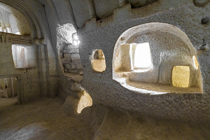 interior of a rock-hewn church in the red valley. 