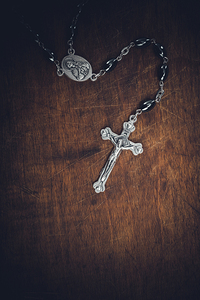 metal rosary with cross 
