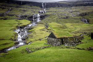 Stone cottage with grass roof saksun faroe islands background