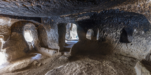 interior of an ancient house carved into the rock in Zelve. 