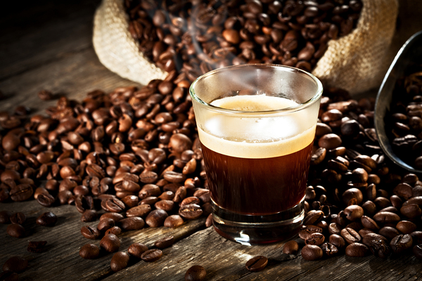 espresso and coffee grain by Gualtiero Boffi