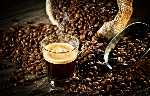 espresso and coffee grain by Gualtiero Boffi