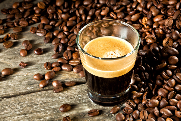 espresso and coffee grain by Gualtiero Boffi