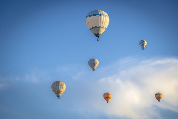 hot air balloons fly high in the Turkish sky Print