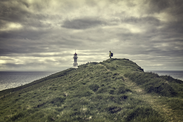 lighthouse in mykines faroe islands Print