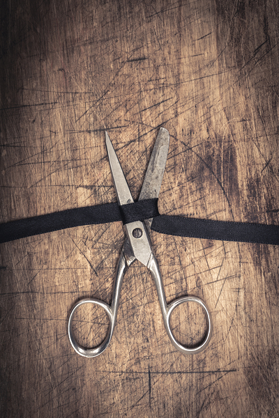 black ribbon cutting scissors