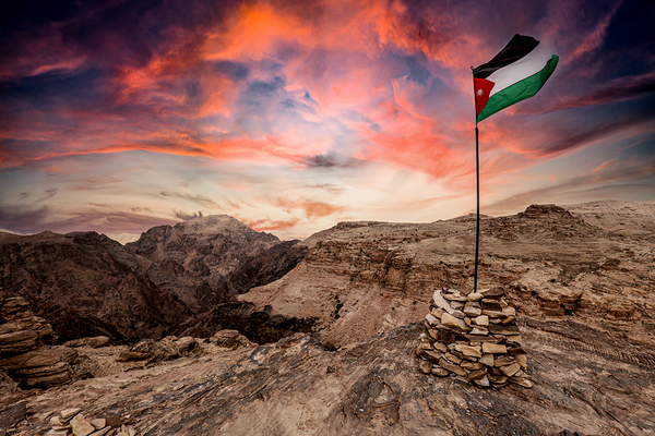 jordan flag on the mountains near petra. Print