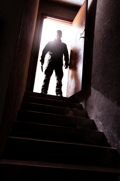 killer and stair by Gualtiero Boffi
