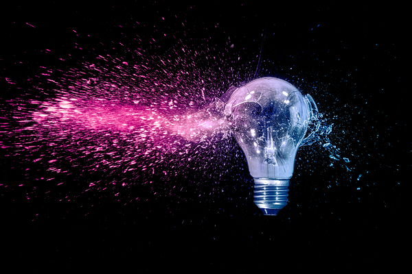 blue and red electric bulb shattering