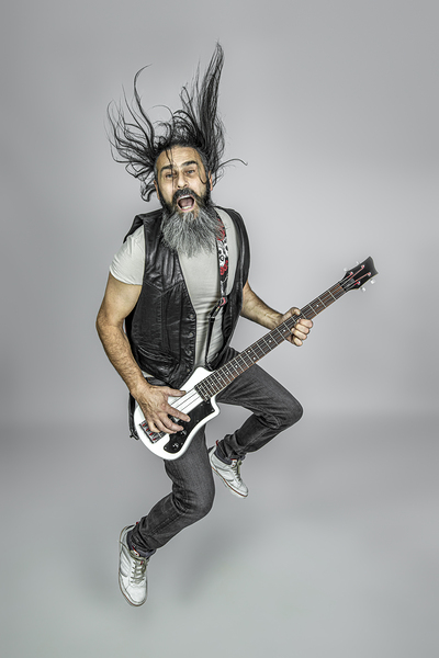 electric bass player jumps Print