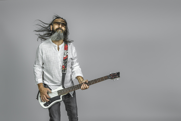 bass player with beard and long hair. Print