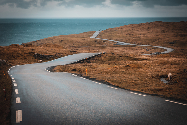 Winding road in the middle of the Faroe Islands.