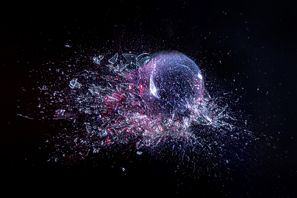 explosion of a glass ball on a black background.  Print