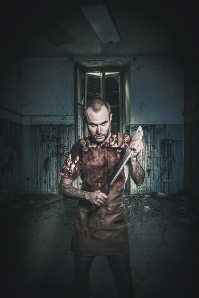 serial killer with machete and blood stained apron