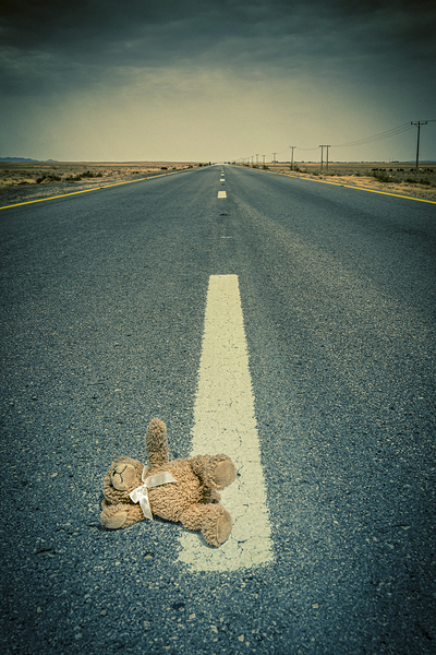 lonely road and teddy bear by Gualtiero Boffi