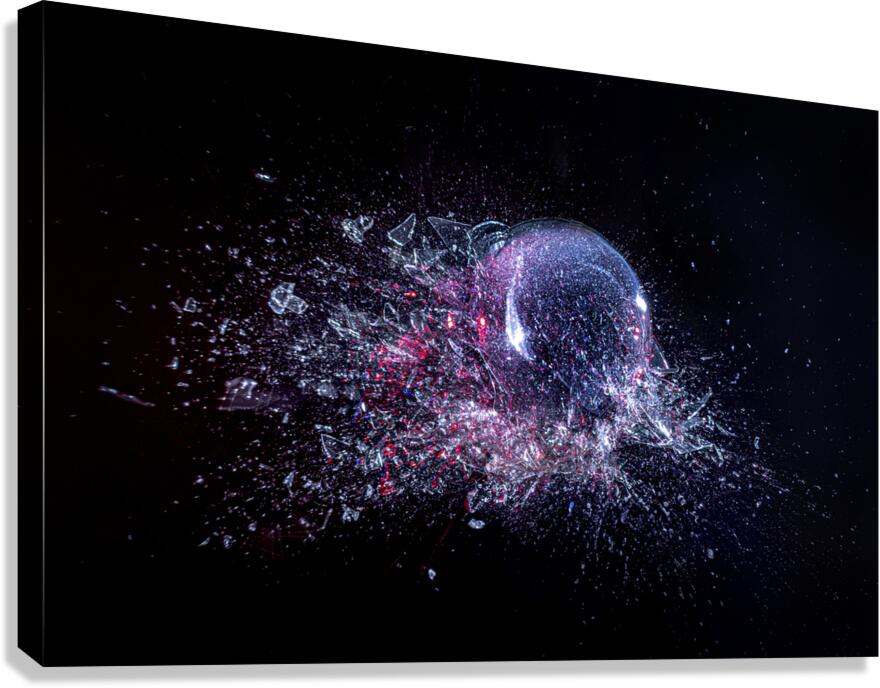 explosion of a glass ball on a black background.  Canvas Print