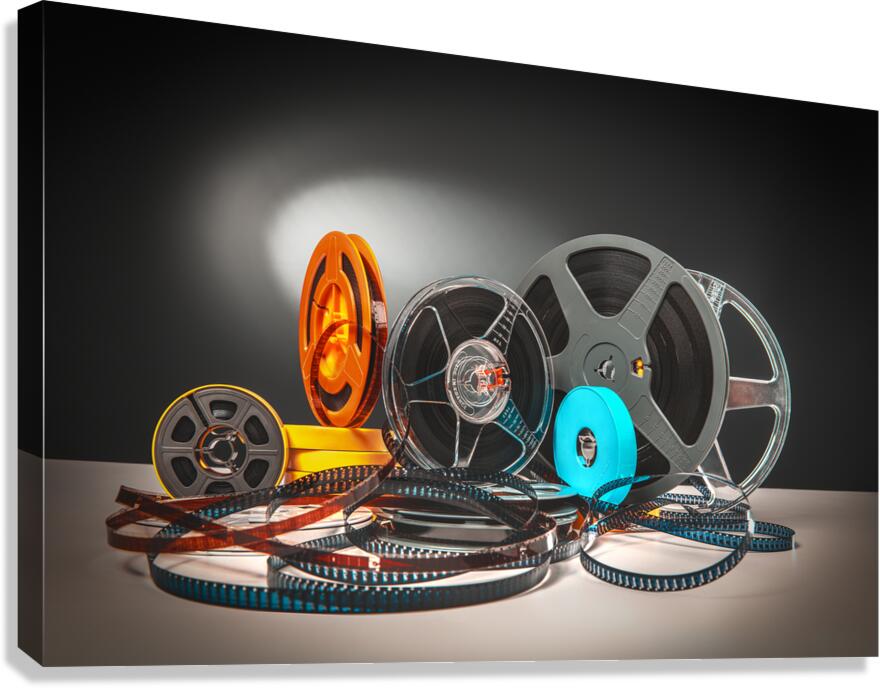 film-themed background old Super 8 reels  Canvas Print