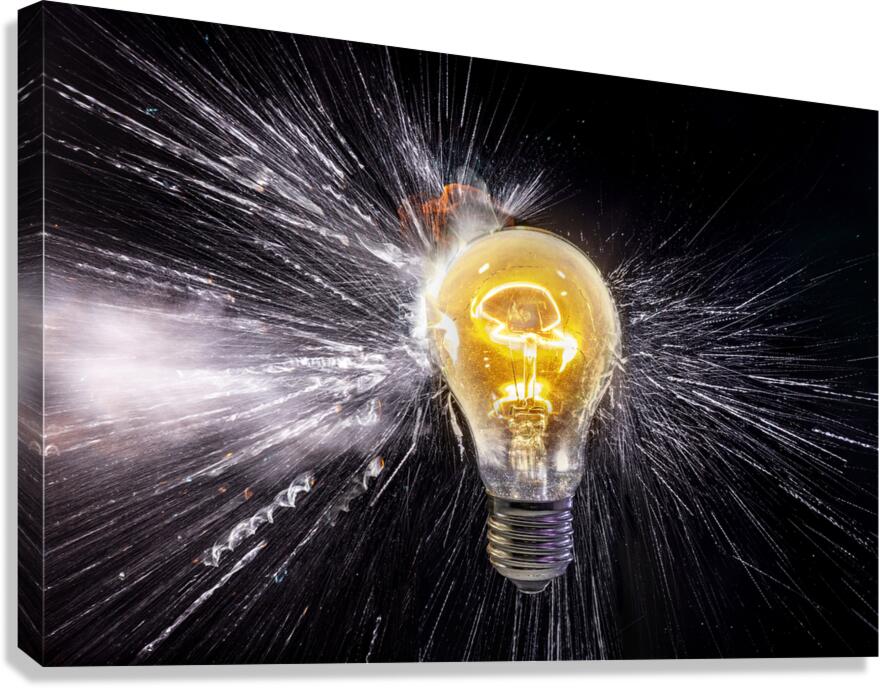 electric bulb breaks with shrapnel scattering quickly Canvas Print