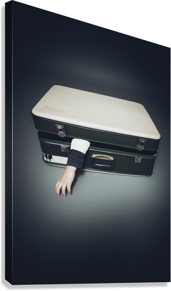 arm sticks out of an suitcase Canvas Print