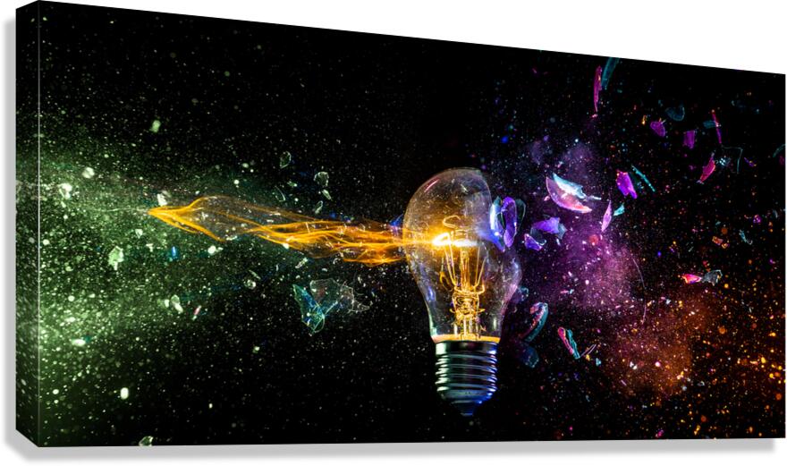 Exploding light bulb concept on dark background Canvas Print