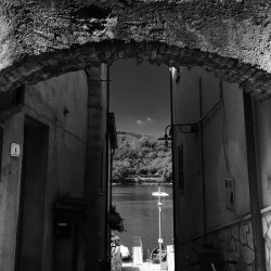 Arch by the lake
