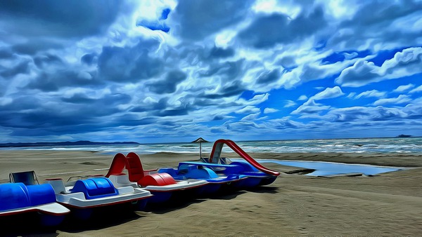 A Row of Beach Boats by J R Picard
