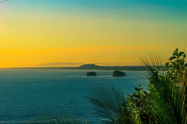 Sunrise Papua New Guinea Coast  by Koisen Wanori