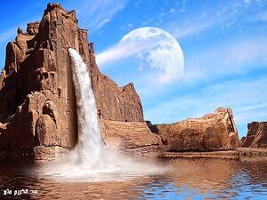 A waterfall flowing from the mountain