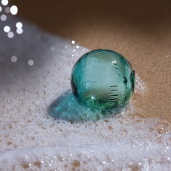 Glass Float on a Golden Sand Beach of Hawaii