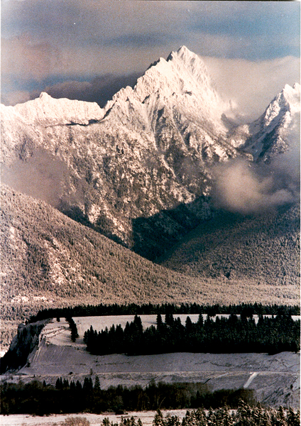 Fisher Peak Winter with Hill Pasture  by Troy Hunter