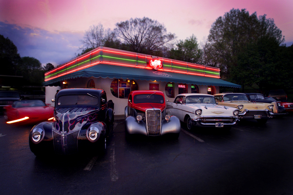 Classic Car Show Under Neon Lights by Michael W Rutherford