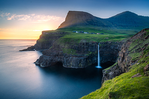 Sunset at a Waterfall in Faroe Islands