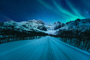 Northern Lights over a Road in Norway