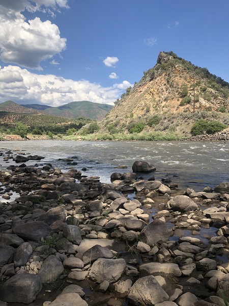 Mountain guard it... The river feeds it by Snap In Motion 