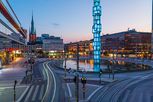 Downtown Stockholm Sergels square at night with car light trails