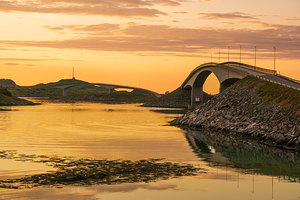 The two bridges connecting Fredvang to the rest of Lofoten Norway at sunset in summer