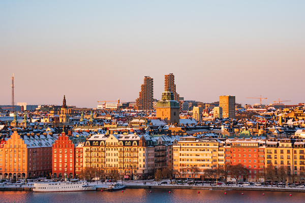 Sunset over Kungsholmen Stockholm Sweden with historic colorful buildings and Norra tornen. Print