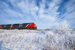 Train Passing a Snowy Landscape