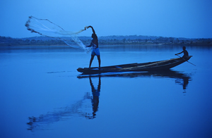 Gwari man casting net