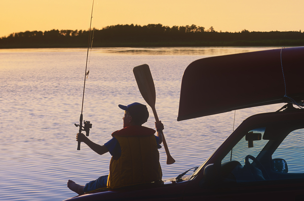 Boy Fishing by Dave Reede Photohgraphy